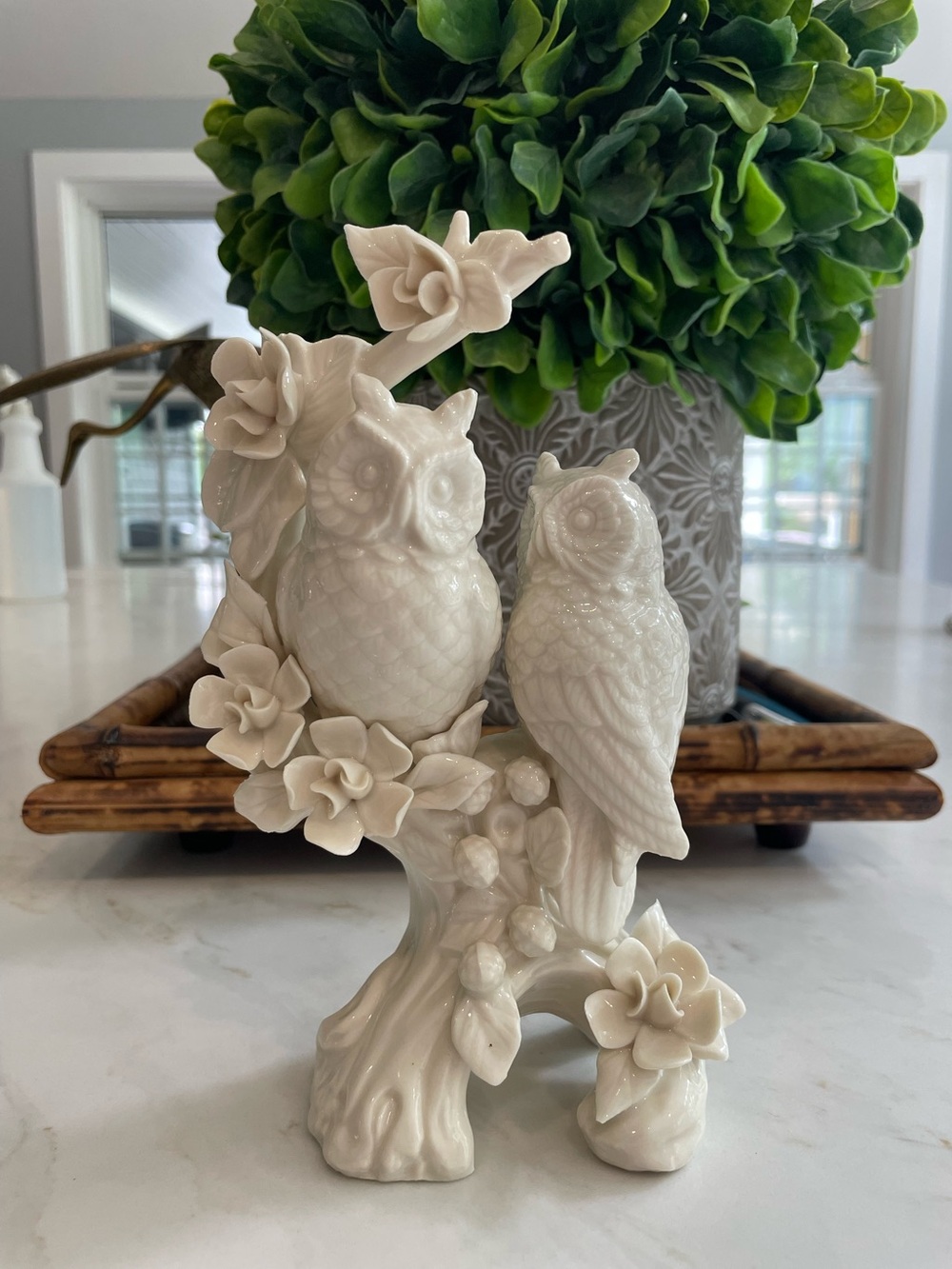 Vintage Paris Royal porcelain owls on branches with delicate flowers.